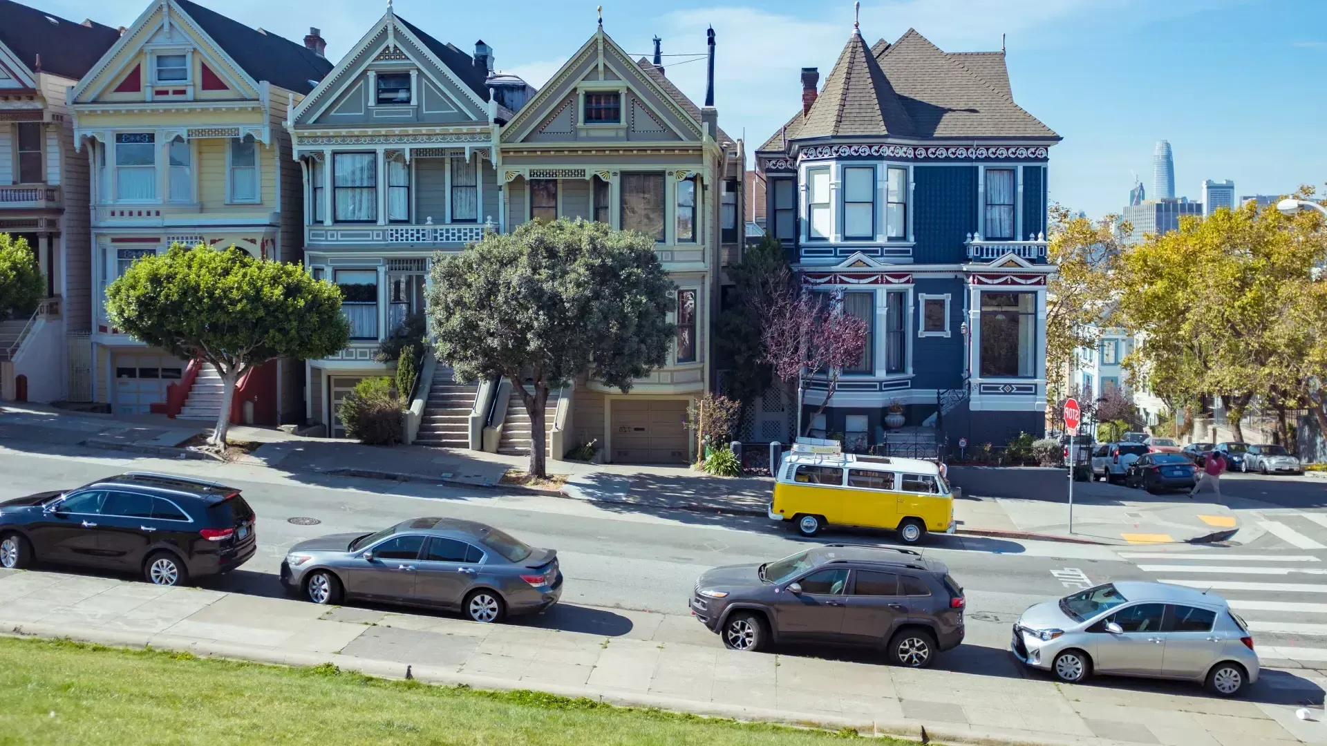 Cars parked in front of the Painted Ladies
